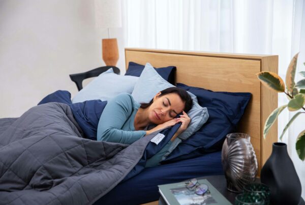 Adult sitting awake at night illustrating insomnia and restlessness during cannabis withdrawal