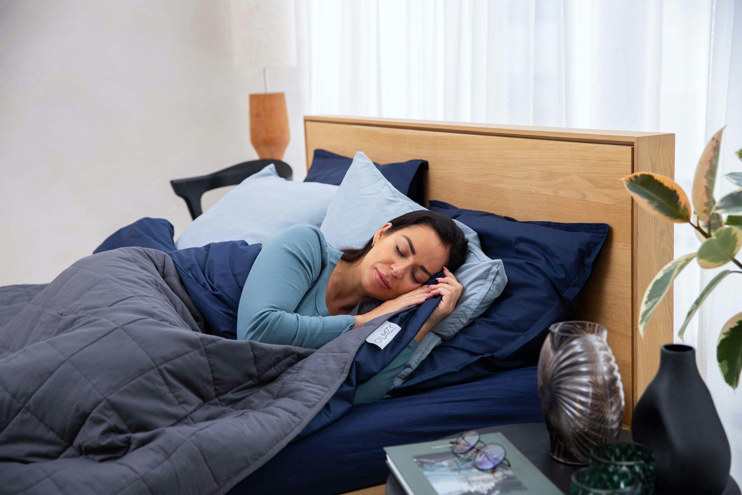 Adult sitting awake at night illustrating insomnia and restlessness during cannabis withdrawal