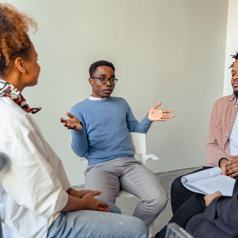 Empathetic therapy conversation in bright West Palm Beach clinical setting for personality disorder treatment